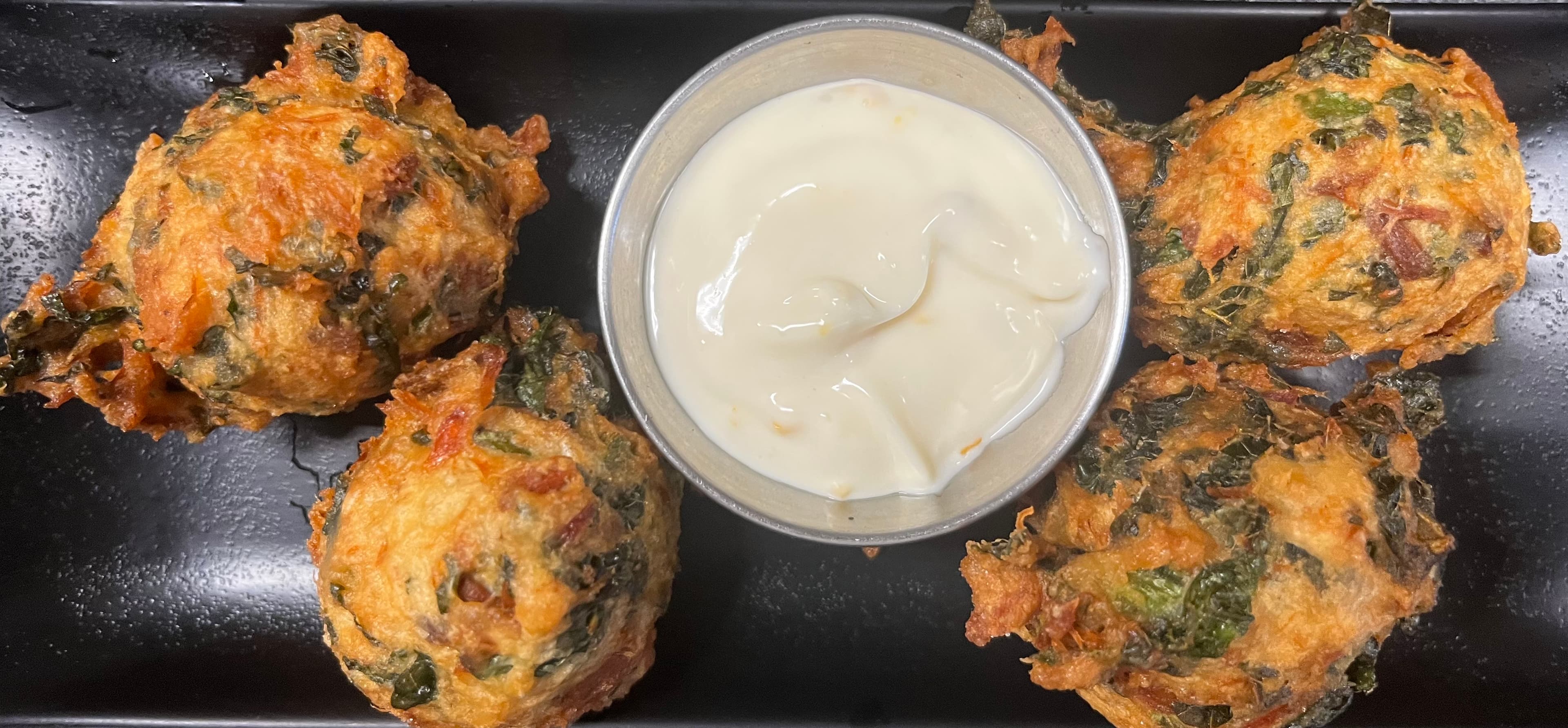 Salt fish and callaloo fritters - appetizer picture